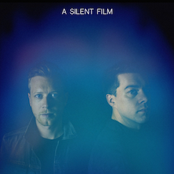 News Added Aug 26, 2015 A Silent Film is an English alternative rock band from Oxford. The band members of Robert Stevenson, and Spencer Walker The first album, The City That Sleeps, was released on 6 October 2008. A Silent Film released their second album named Sand & Snow on June 5, 2012. The album […]